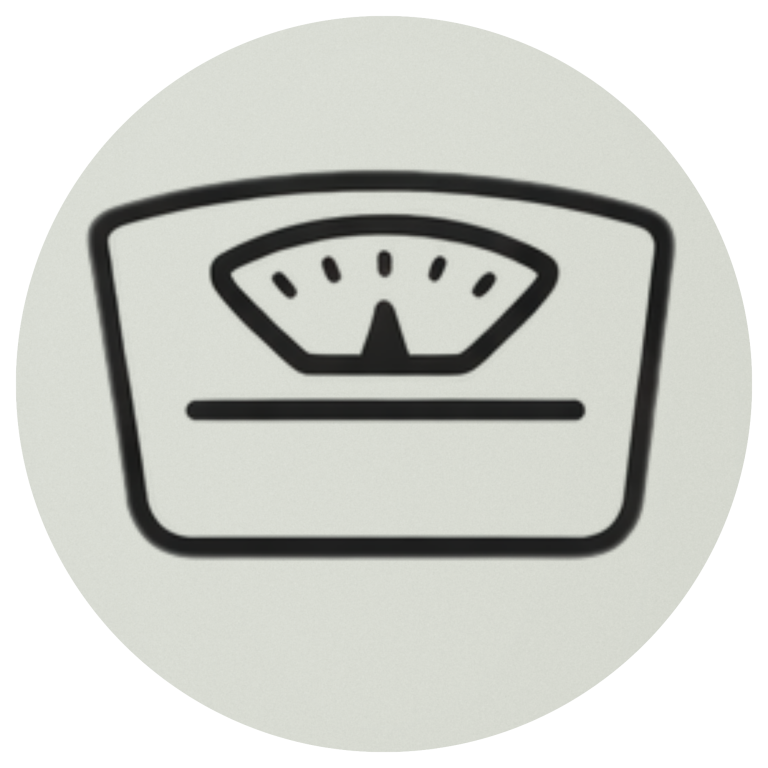 Eine analoge Waage mit einem Ziffernblatt und Zeiger.