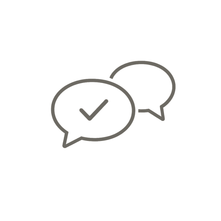 Zwei Sprechblasen mit einem Häkchen in der linken Blase.